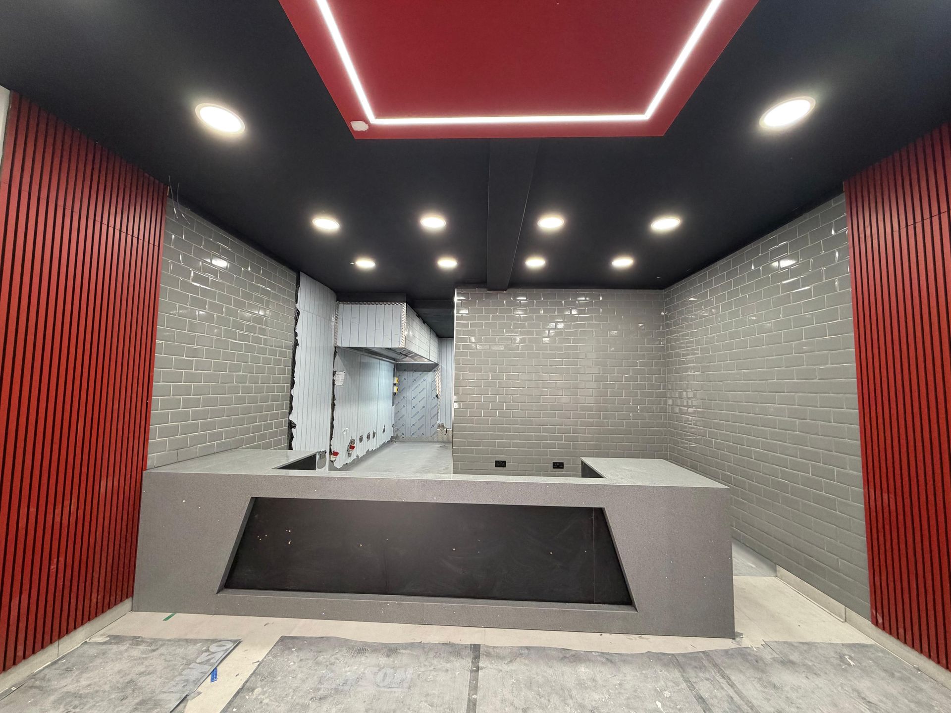 Grey quartz servery counter in a commercial takeaway fit-out